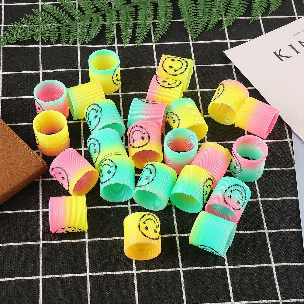 12 or 24 Slinky Smiley Mini Springs Pinata Party Bag Fillers Wedding Kids Toys