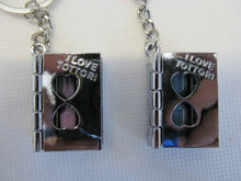 Load image into Gallery viewer, SET OF 2 LOVERS PINK/BLUE SANDS OF TIME BOOKS OPENING PAGE KEYRING GIFT UKSELLER
