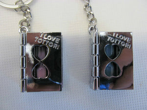SET OF 2 LOVERS PINK/BLUE SANDS OF TIME BOOKS OPENING PAGE KEYRING GIFT UKSELLER