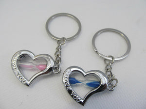 2 LOVERS PINK/BLUE SANDS OF TIME HEARTS I LOVE YOU KEYRING GIFT CHARM UK SELLER