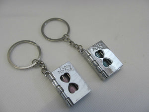 SET OF 2 LOVERS PINK/BLUE SANDS OF TIME BOOKS OPENING PAGE KEYRING GIFT UKSELLER