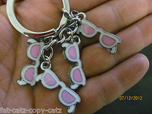 Load image into Gallery viewer, GIRLY NERD 4 PIECE PINK WHITE SUN GLASSES ENAMEL KEYRING HANDBAG CHARM GIFT IDEA
