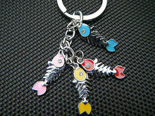 Load image into Gallery viewer, 4 PIECE METAL CUTE FISH BONES DIAMONTE JEWEL KEYRING COLLECTABLE HANDBAG CHARM
