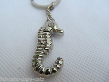Load image into Gallery viewer, METAL SILVER TONE SEA HORSE FISH COLLECTABLE KEYRING CHARM GIFT IDEA UK SELLER
